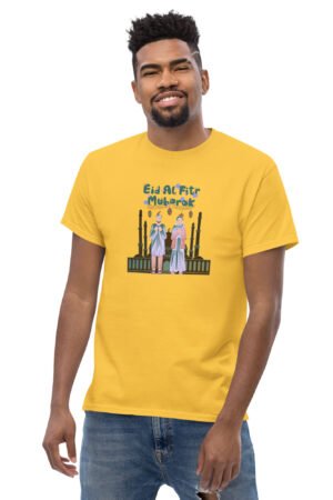 Man wearing yellow Eid Mubarak T-shirt with festive Arabic-inspired design