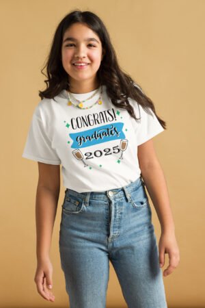 Smiling graduate wearing a Women’s Class of 2025 shirt celebrating her big day