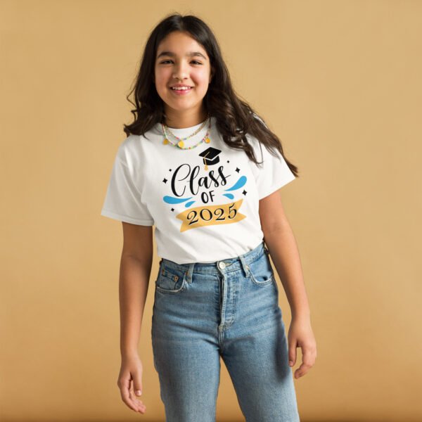 Smiling female graduate wearing a cute graduation shirt for women from the Class of 2025 collection.