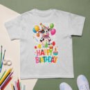 Cartoon cow birthday t-shirt for kids with party balloons and hats
