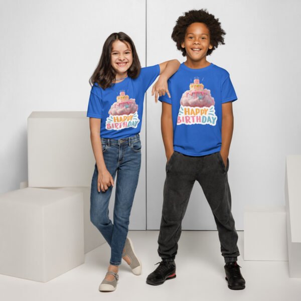 Two kids smiling in blue birthday cake t-shirts with floating cake design