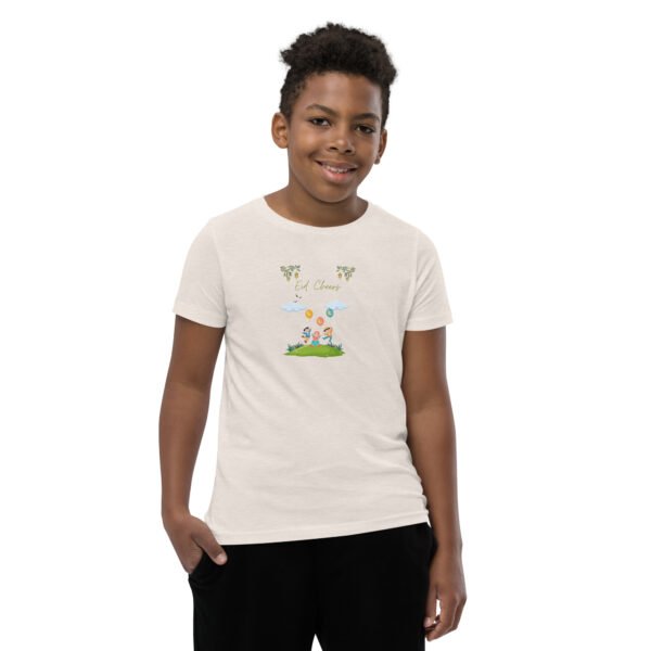 Boy wearing festive Eid Celebration T-Shirt with cheerful design for Ramadan and Eid