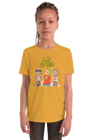Boy wearing yellow Eid Mubarak kids T-shirt with festive Islamic print