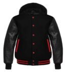 Black hoodie varsity jacket with white sleeves and drawstring hood